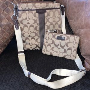 Cross body bag with wristlet.